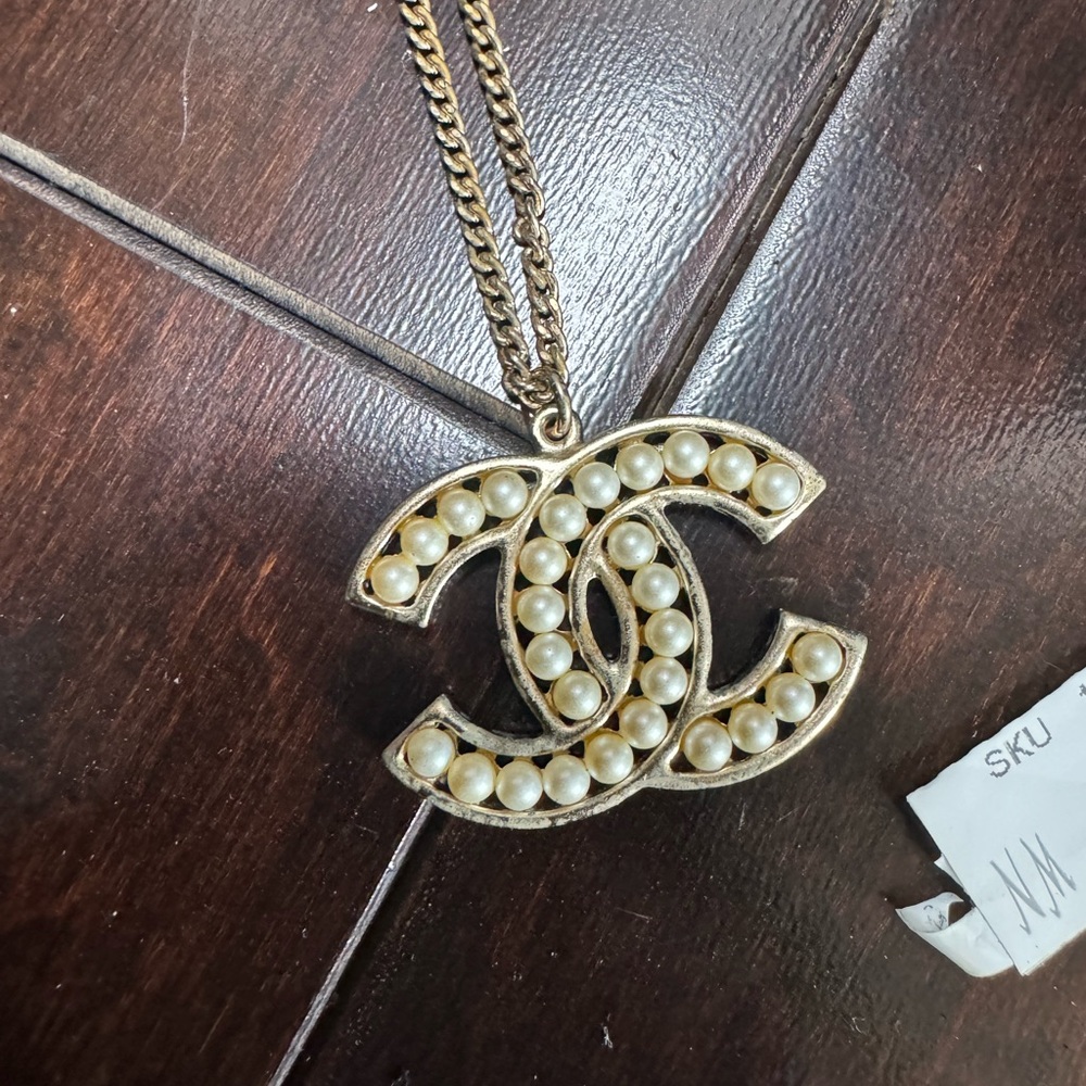 Gold Chanel logo necklace